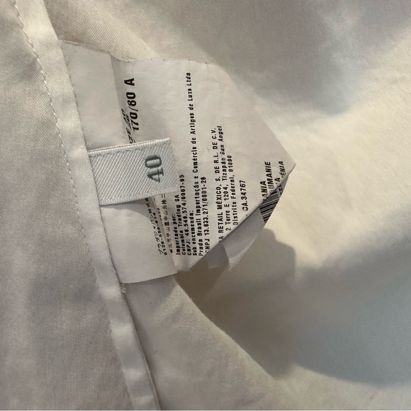 Prada button-up with brass detailing around the shoulders and collar. Size 40 - Picture 5 of 6